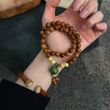 Chunhe Jingming Kuk Bodhi Multi-Wrap Mala Bracelet – 8mm Triple Wrap & 9mm Double Wrap with Lacquer-Style Green Focal Bead