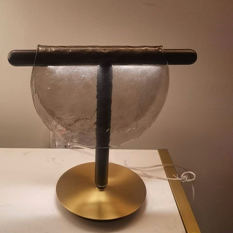 Smoke grey textured half moon glass table lamp front view