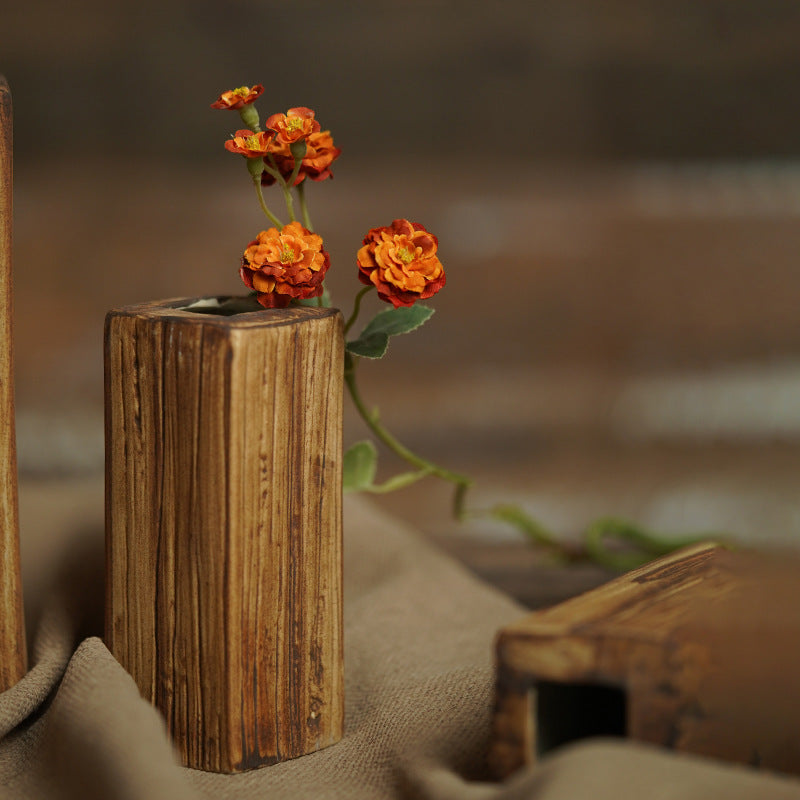 Medium faux wood grain rectangular ceramic bud vase with orange flowers