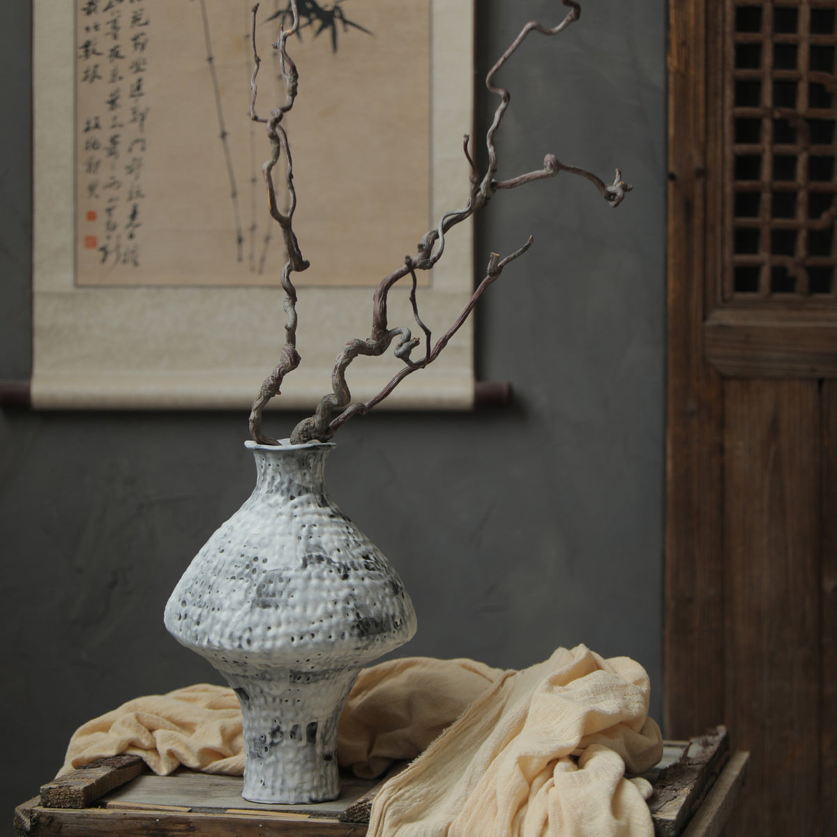 Mottled white rustic ceramic vase in New Chinese style interior