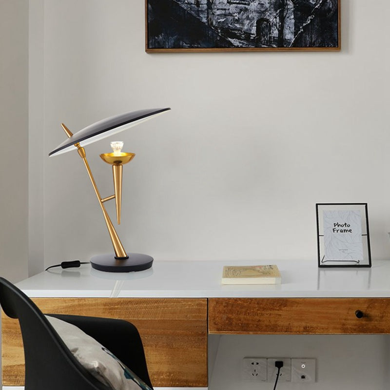 Contemporary balance lamp styled on a console table