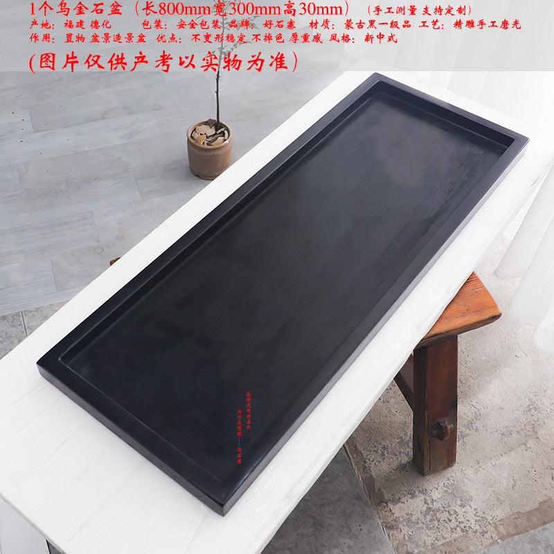 Large rectangular black stone bonsai tray with raised rim