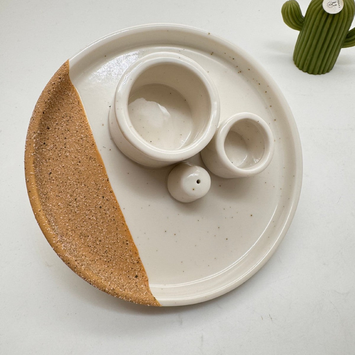 Speckled ivory and sand ceramic ritual tray with sage and Palo Santo holders