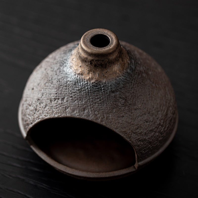 Top view of textured warm hill ceramic ritual fireplace with chimney vent