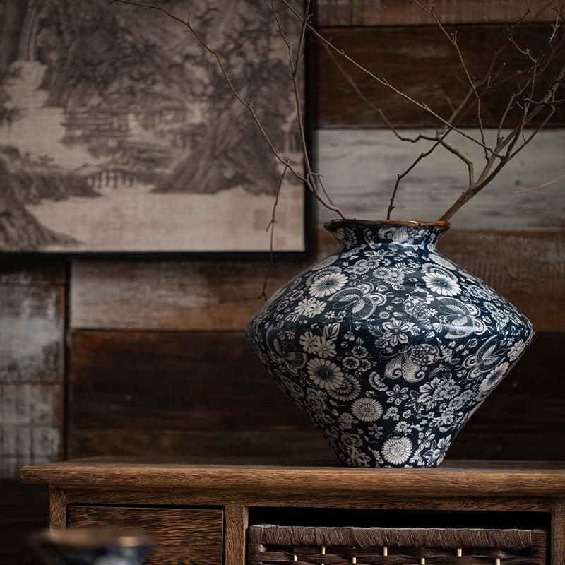 Indigo floral ceramic vase with chrysanthemum pattern and bare branches