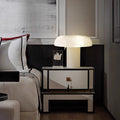 Marble and patterned glass mushroom table lamp in bedroom