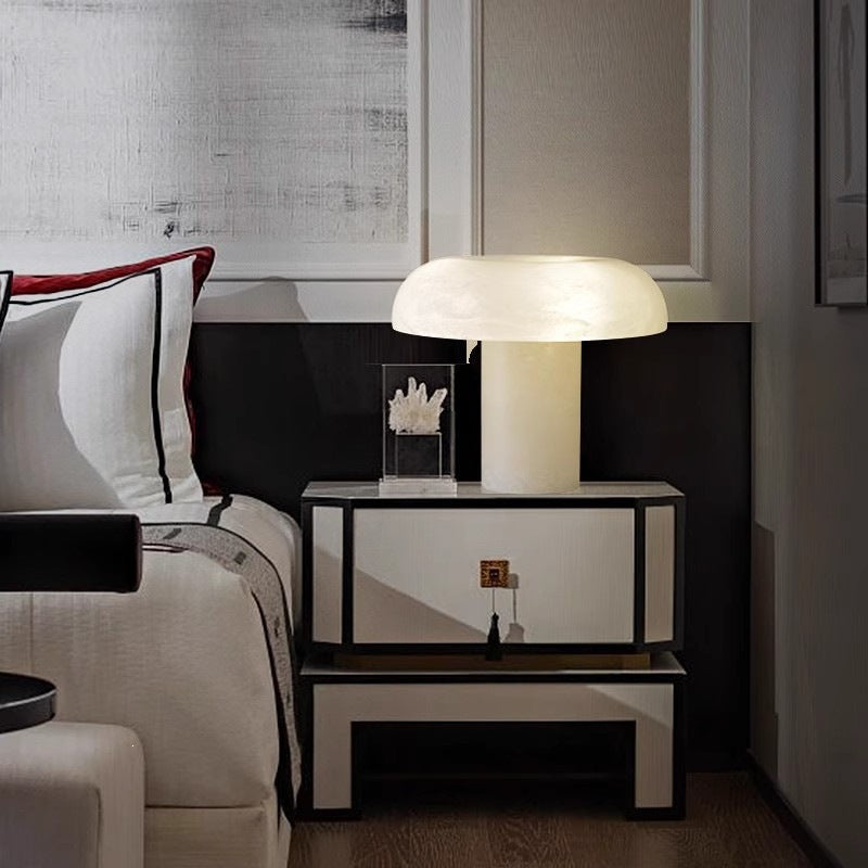 Marble and patterned glass mushroom table lamp in bedroom