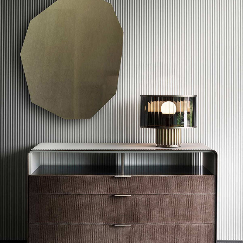 Tea glass sculptural bedside lamp styled in modern luxury interior