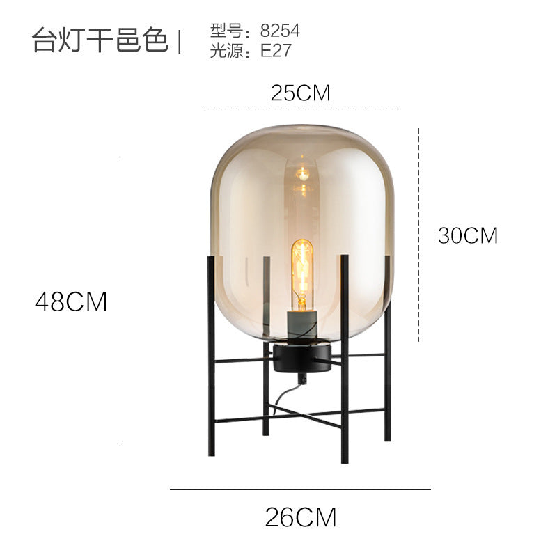 Amber glass cage lamp 28cm by 42cm with black metal frame