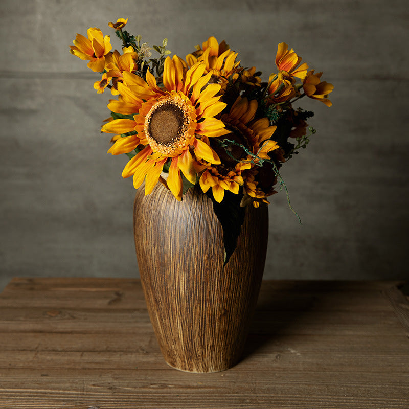 Bronze brown brushed ceramic vase with sunflower arrangement