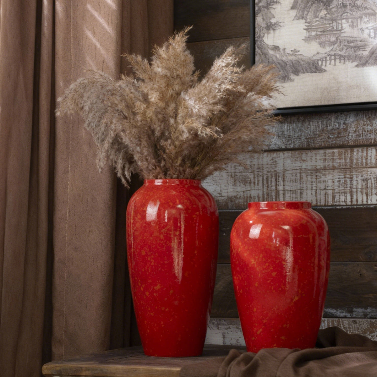 Red gold-speckled tall ceramic vase pair with pampas grass