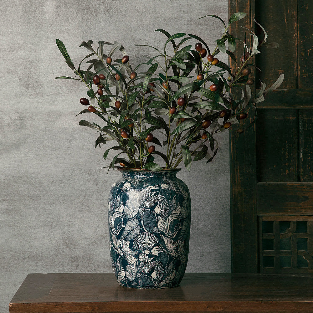 Medium indigo shell-pattern ceramic vase with berry branches