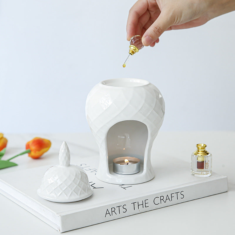 White ceramic aroma lamp with removable lid and tealight chamber