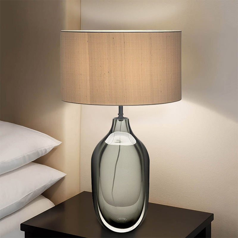 Smoke grey glass oval table lamp with electroplated metal detail