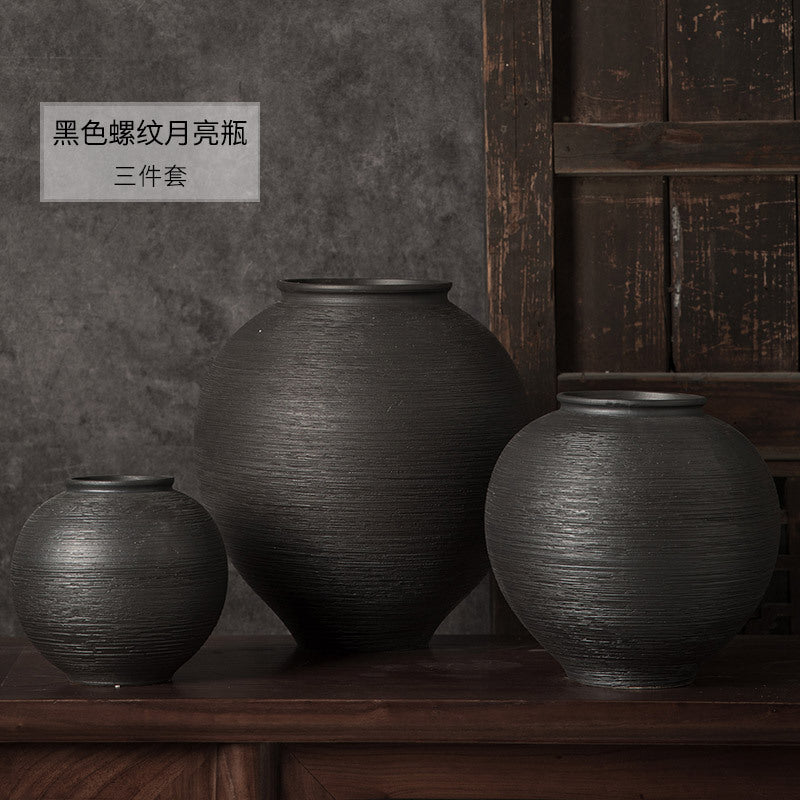 Black ribbed round ceramic vases in three sizes