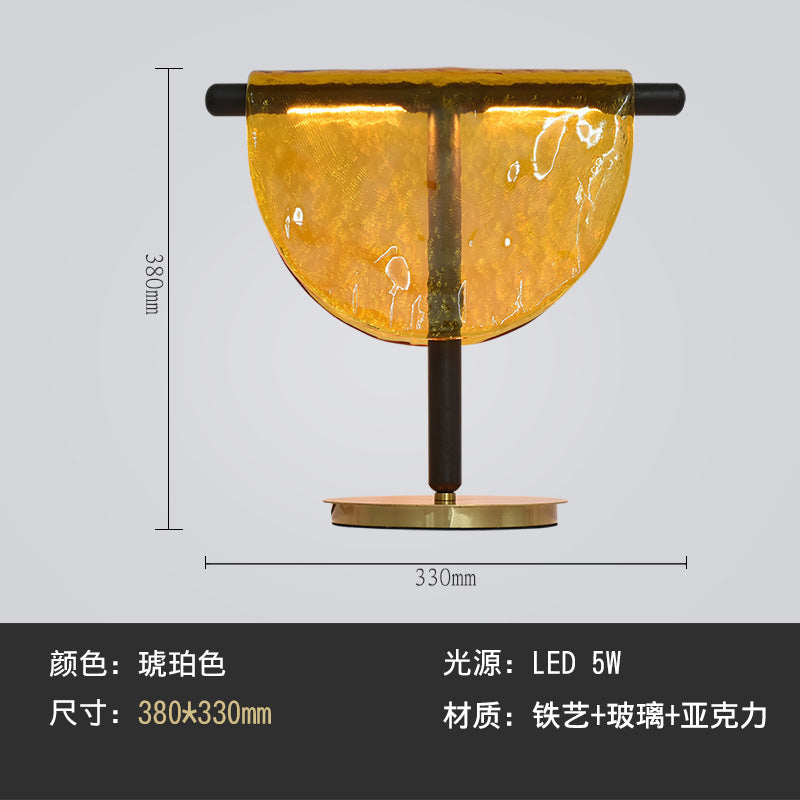 Amber and smoke grey sculptural glass table lamp color comparison
