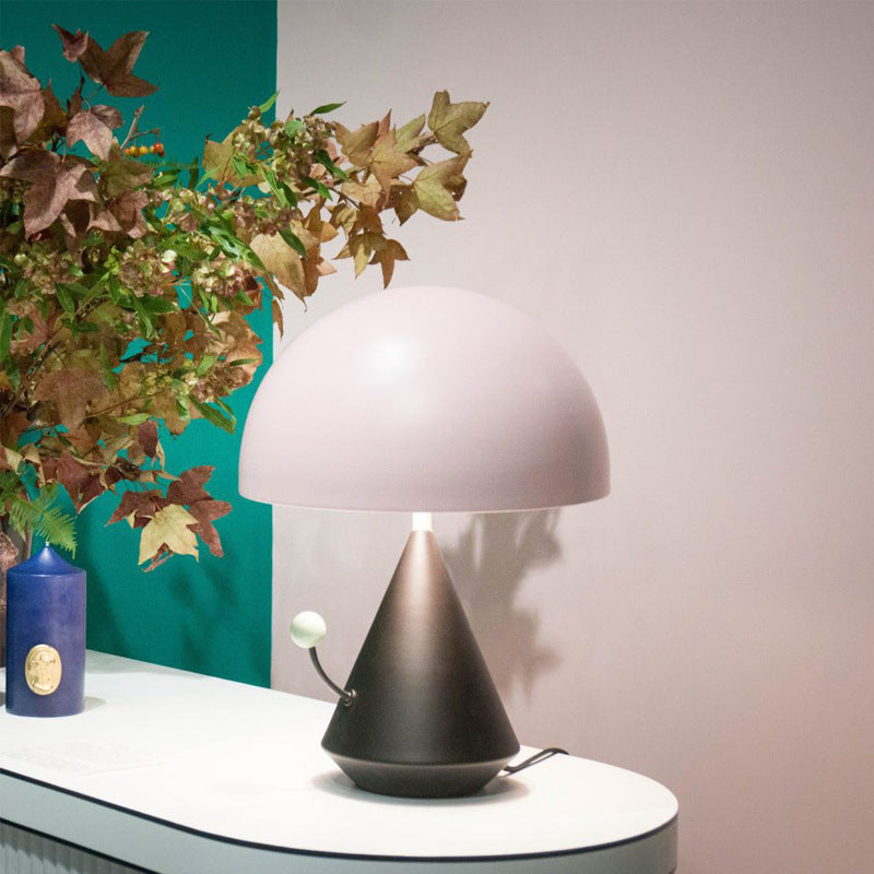 Blush pink dome cone table lamp on modern console