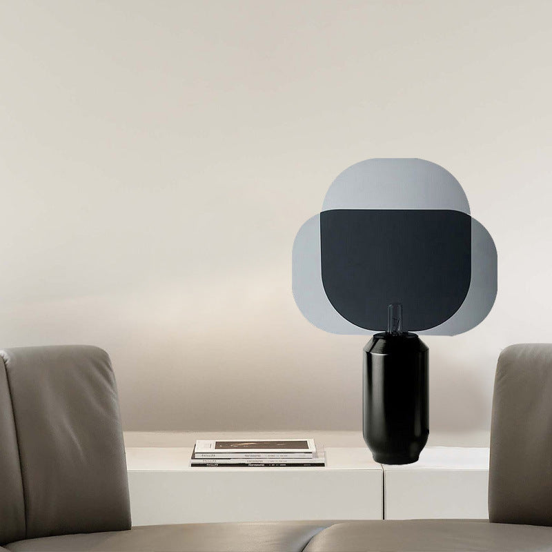 Smoked petal panel table lamp with black center and glossy base