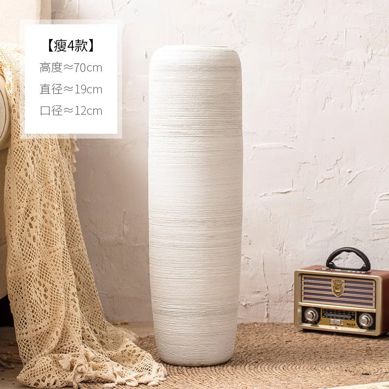 Ivory white slim ribbed ceramic floor vase approximately 70 cm high
