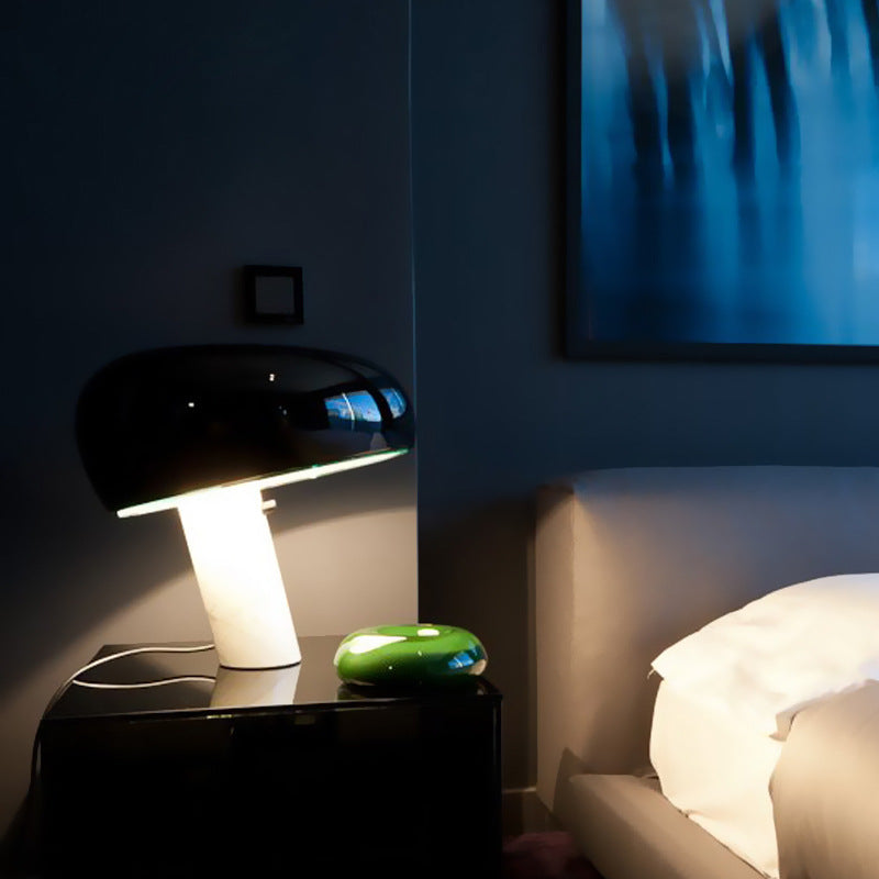 White marble mushroom table lamp on modern sideboard
