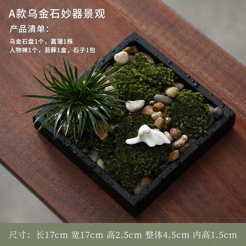 17 cm square black stone moss garden with ornamental grass pebbles and miniature reclining figure