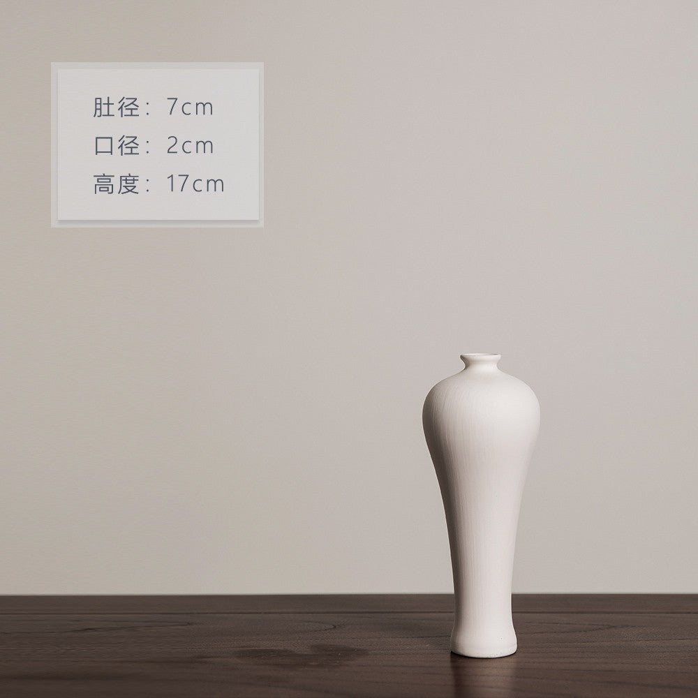 Matte ivory sculptural mini ceramic vase with narrow neck, 17 cm high