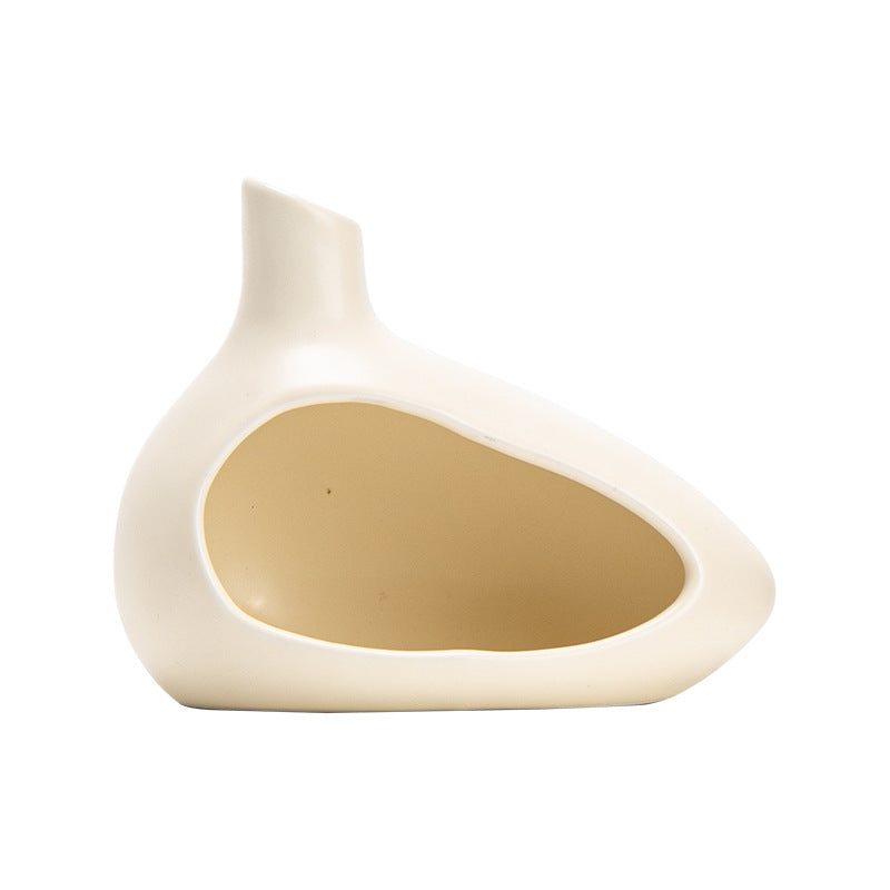 Cream ceramic ritual incense holder isolated on white background