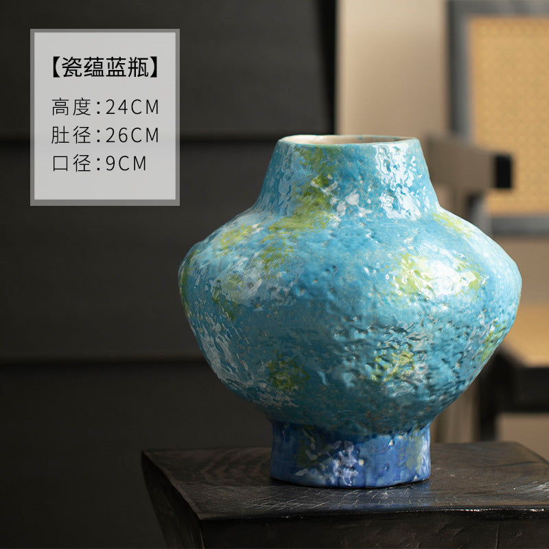 Turquoise blue mottled ceramic vase 24 cm high and 26 cm wide