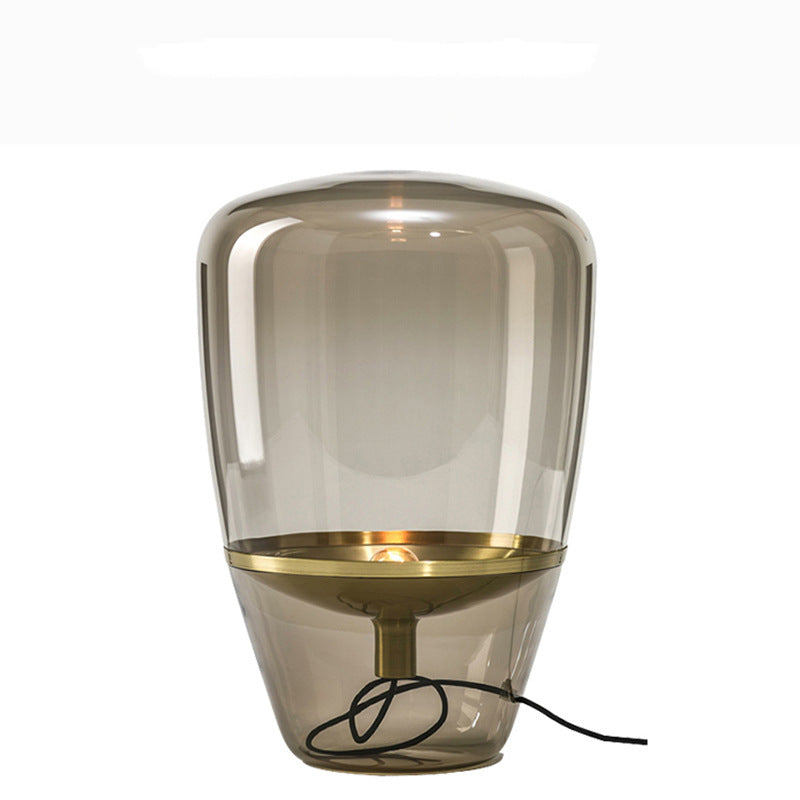 Cognac amber glass and gold metal table lamp front view