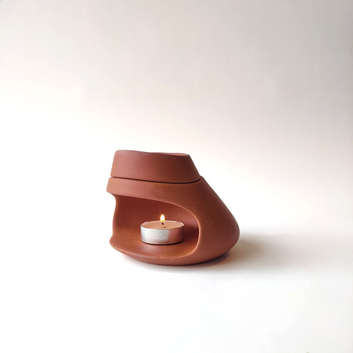 Terracotta ceramic aromatherapy burner with tealight candle front view