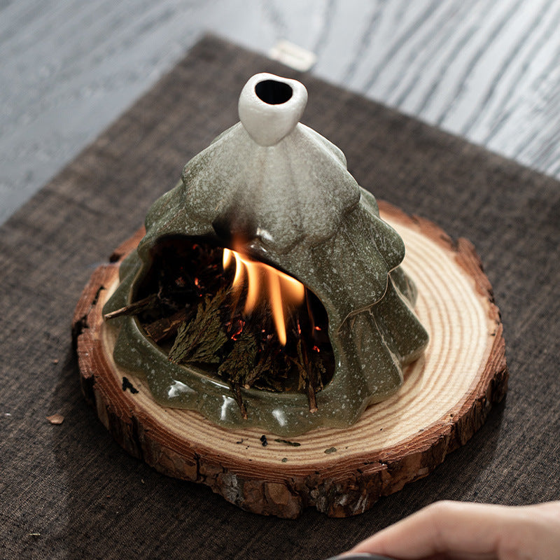 Green Christmas tree ceramic burner used with smudging herbs