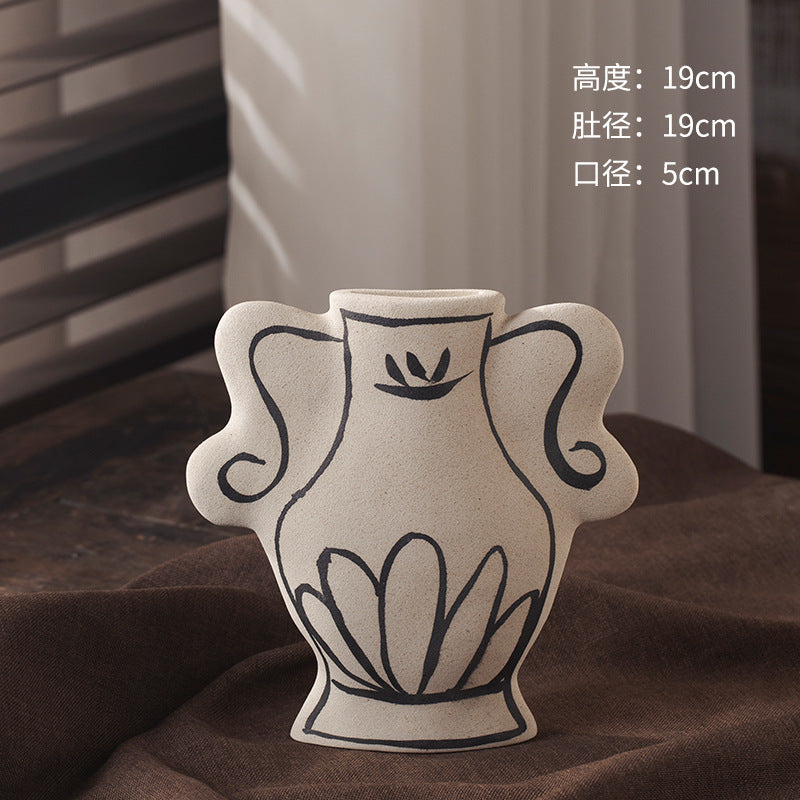 Ivory black-line art handled ceramic vase 19 cm high