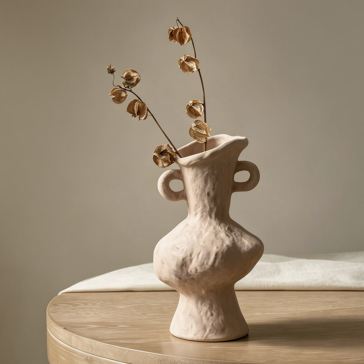 Ivory rustic double-ear ceramic vase with tall amphora silhouette and dried branch styling