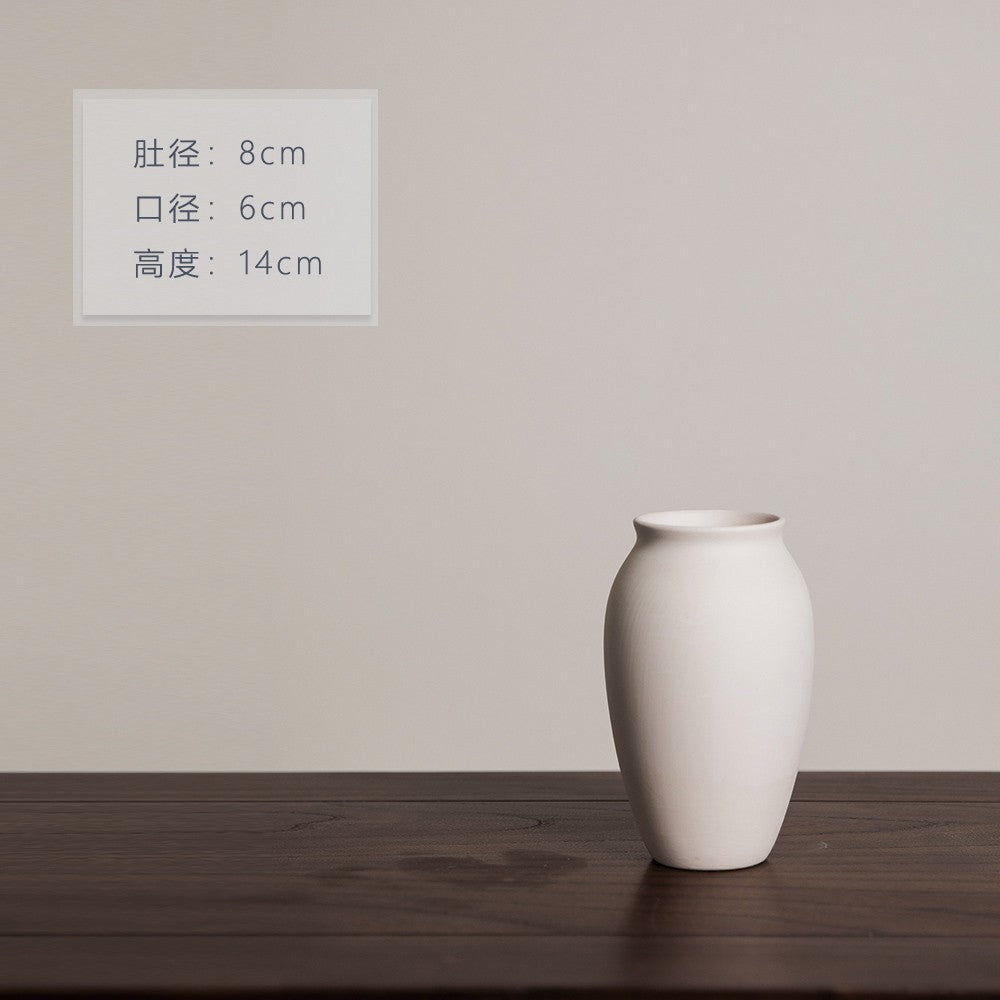 Matte ivory rounded ceramic bud vase with wide mouth, 14 cm high
