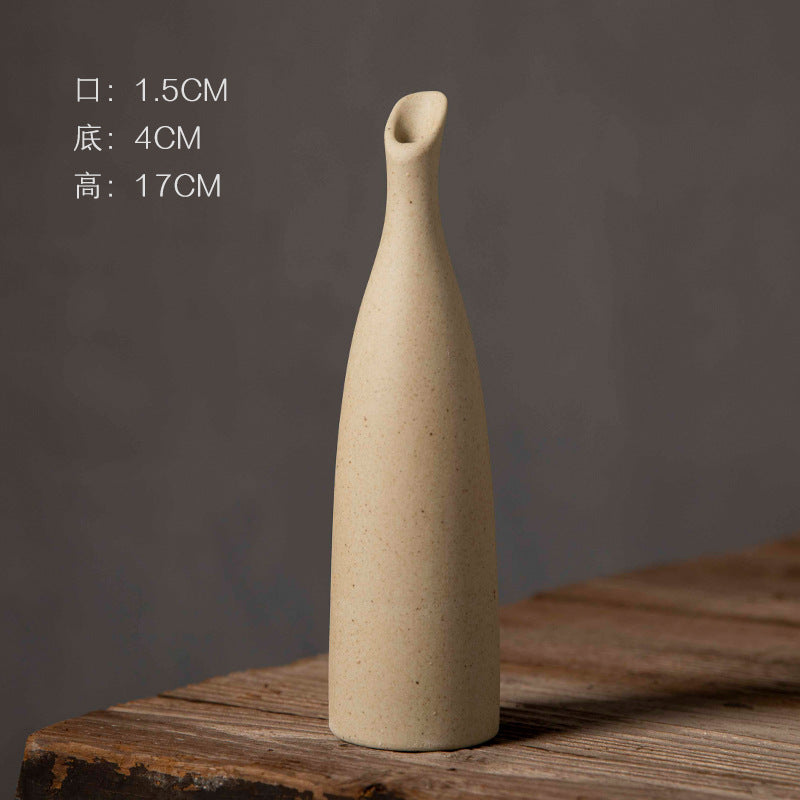 Angled-mouth beige coarse-clay ceramic vase 17 cm high