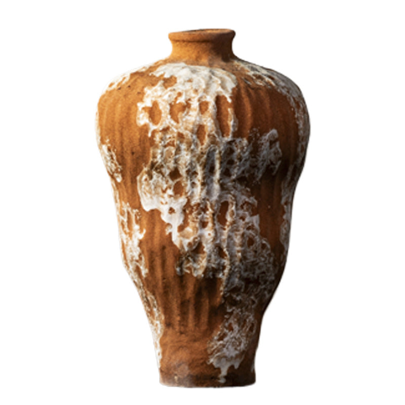 Terracotta orange ceramic vase with white volcanic textured glaze detail