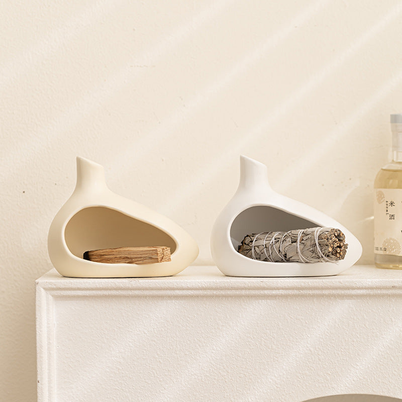 Modern ceramic Palo Santo and sage burner in cream and white for meditation decor