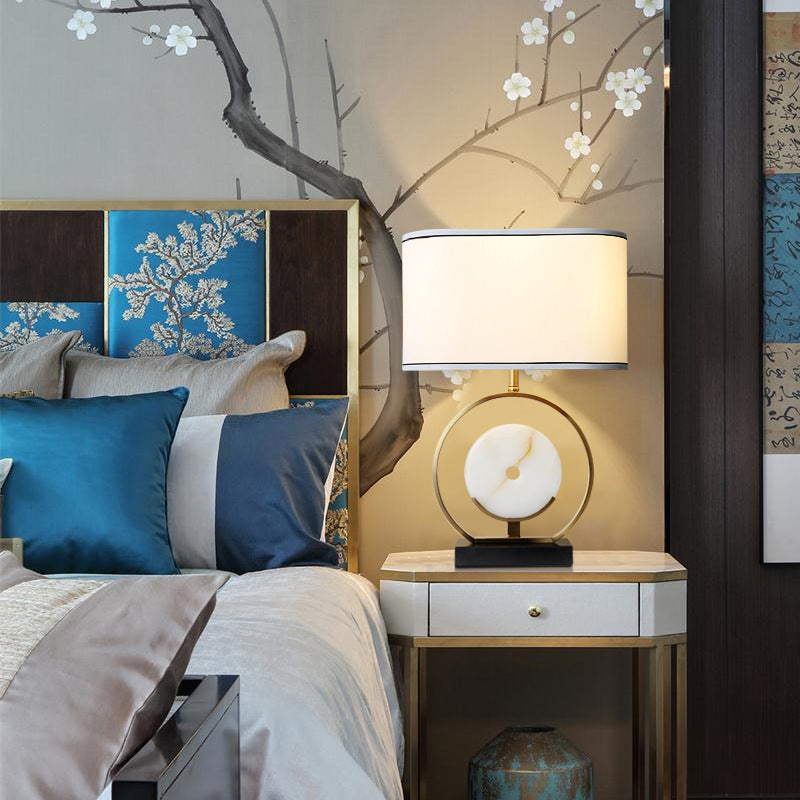 New Chinese bronze ring table lamp with white marble disc and ivory fabric shade