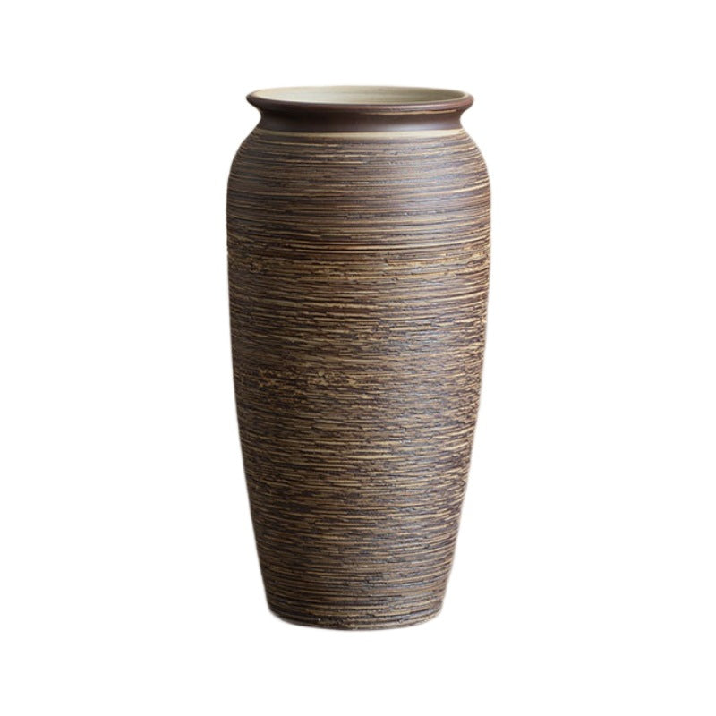 Brown ribbed ceramic vase isolated product view
