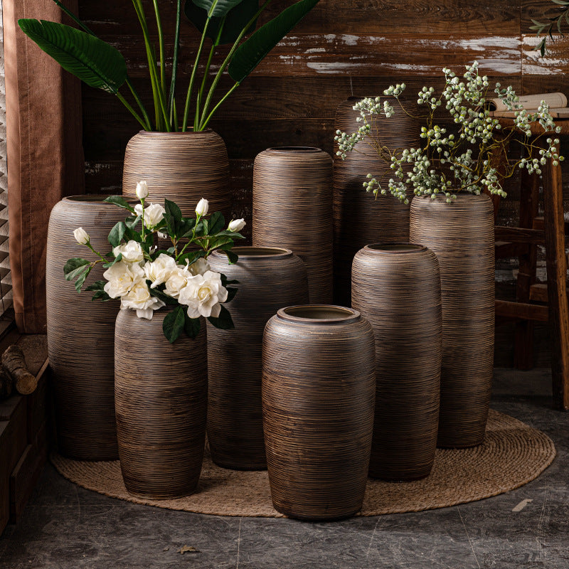 Bronze brown ribbed floor vases in New Chinese style interior