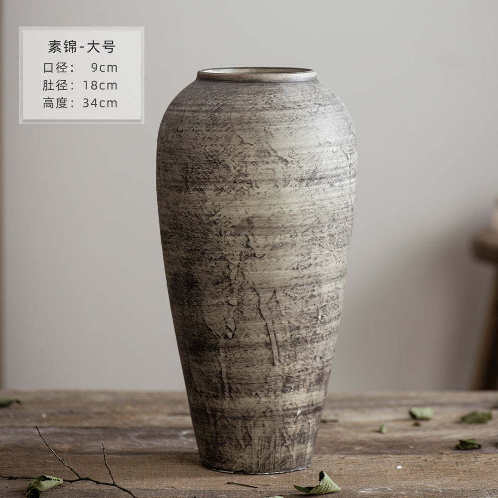 Large grey brown weathered ceramic vase 34 cm high with distressed stone texture