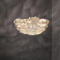 Organic layered sculptural pendant light in warm ivory finish