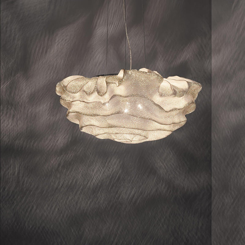 Organic layered sculptural pendant light in warm ivory finish
