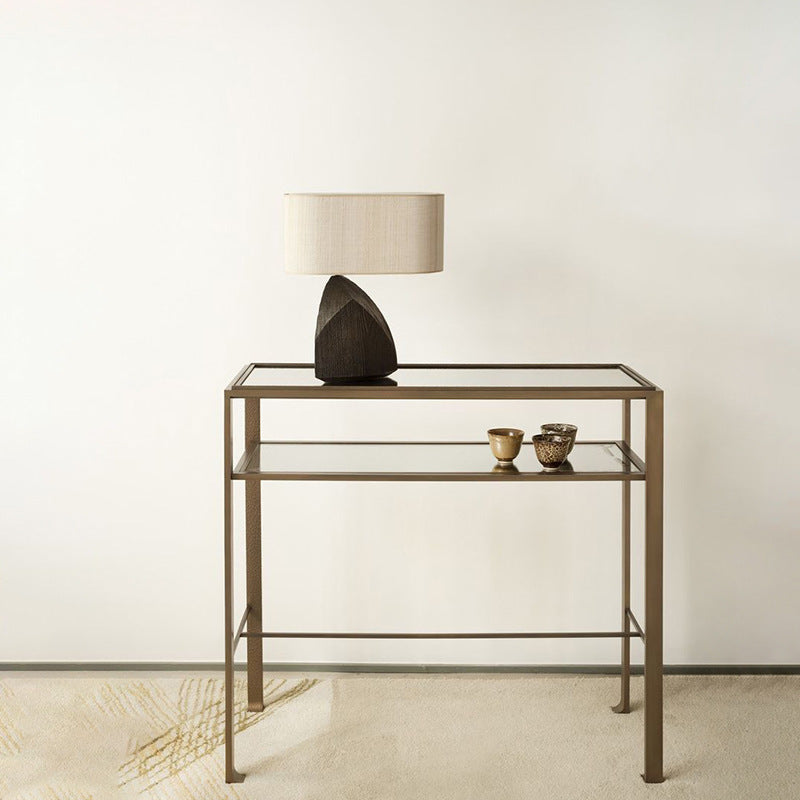 Zen sculptural table lamp with fabric drum shade on console table