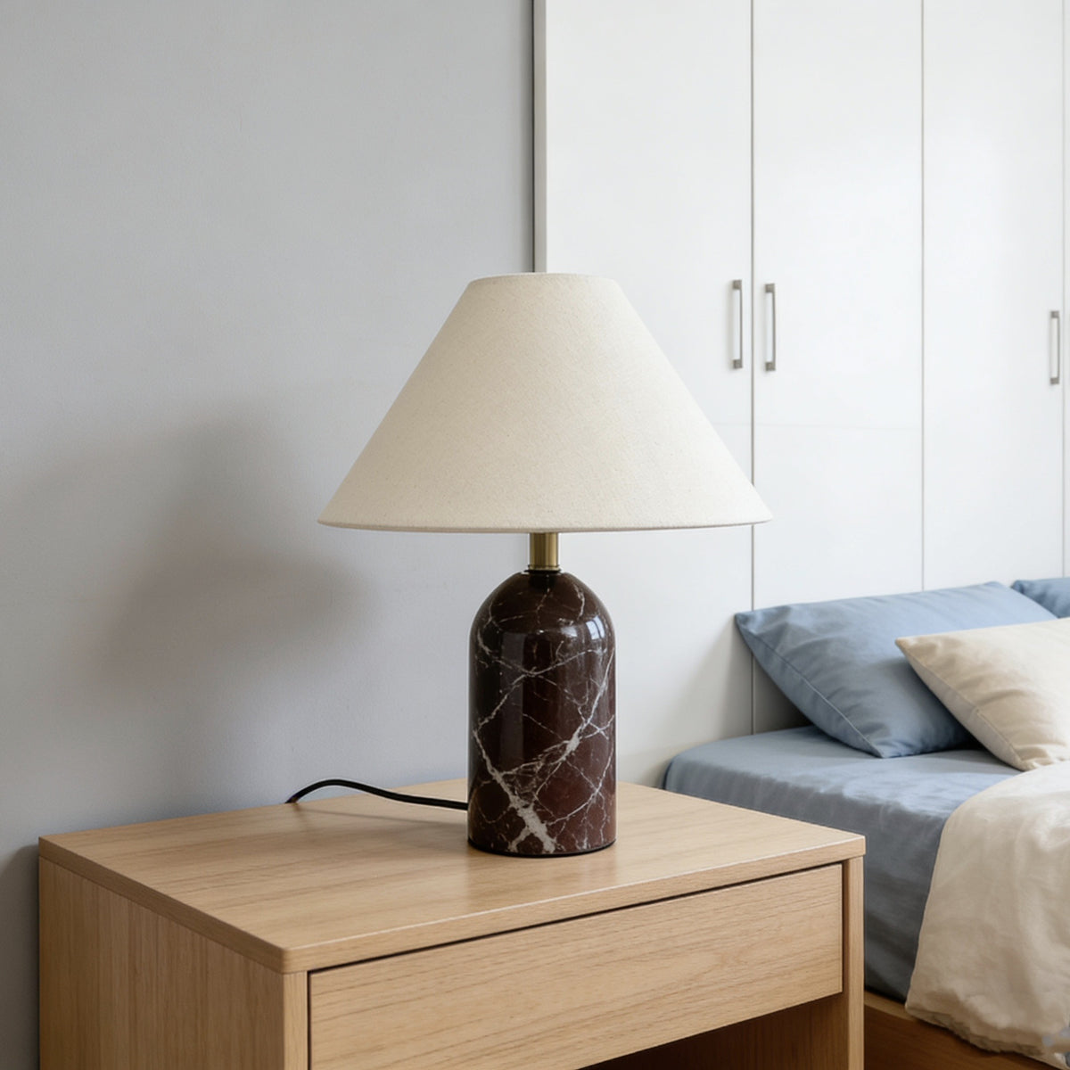 Purple red marble cylinder bedside lamp styled on walnut console