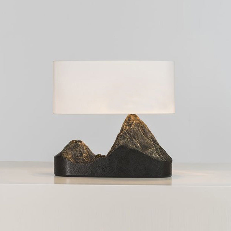 Sculptural dark resin twin peak table lamp with white rectangular shade