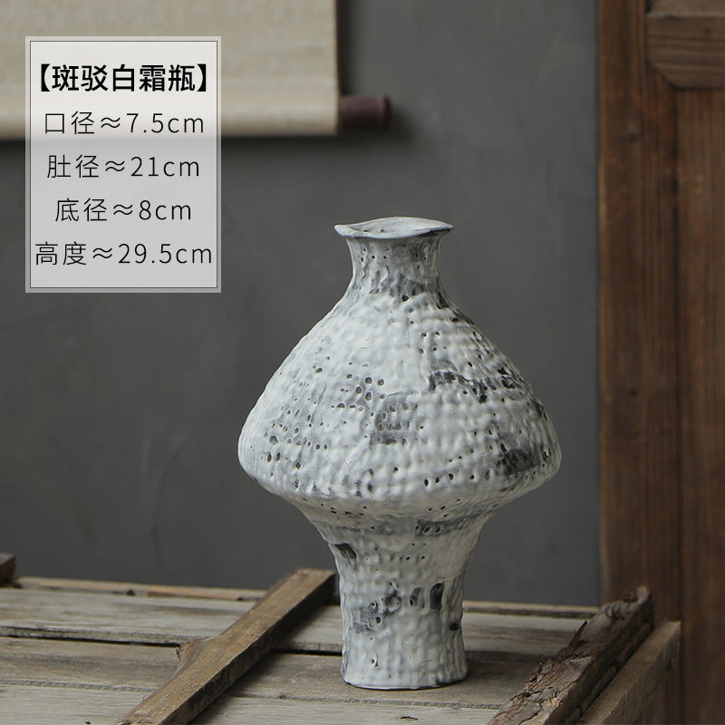 Mottled white ceramic vase 29.5 cm high and 21 cm wide