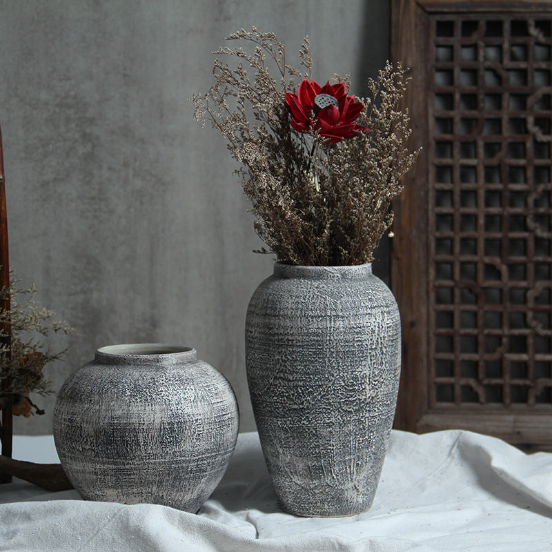 Grey white textured ceramic vase pair with dried flowers