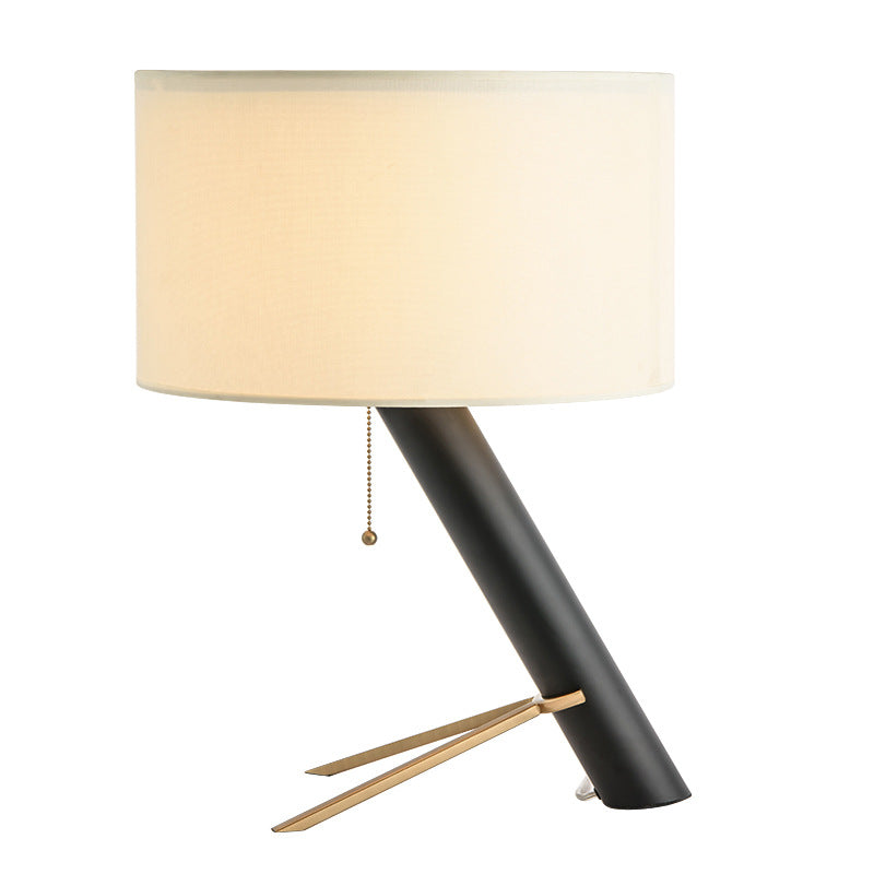 Modern sculptural black metal table lamp with ivory shade