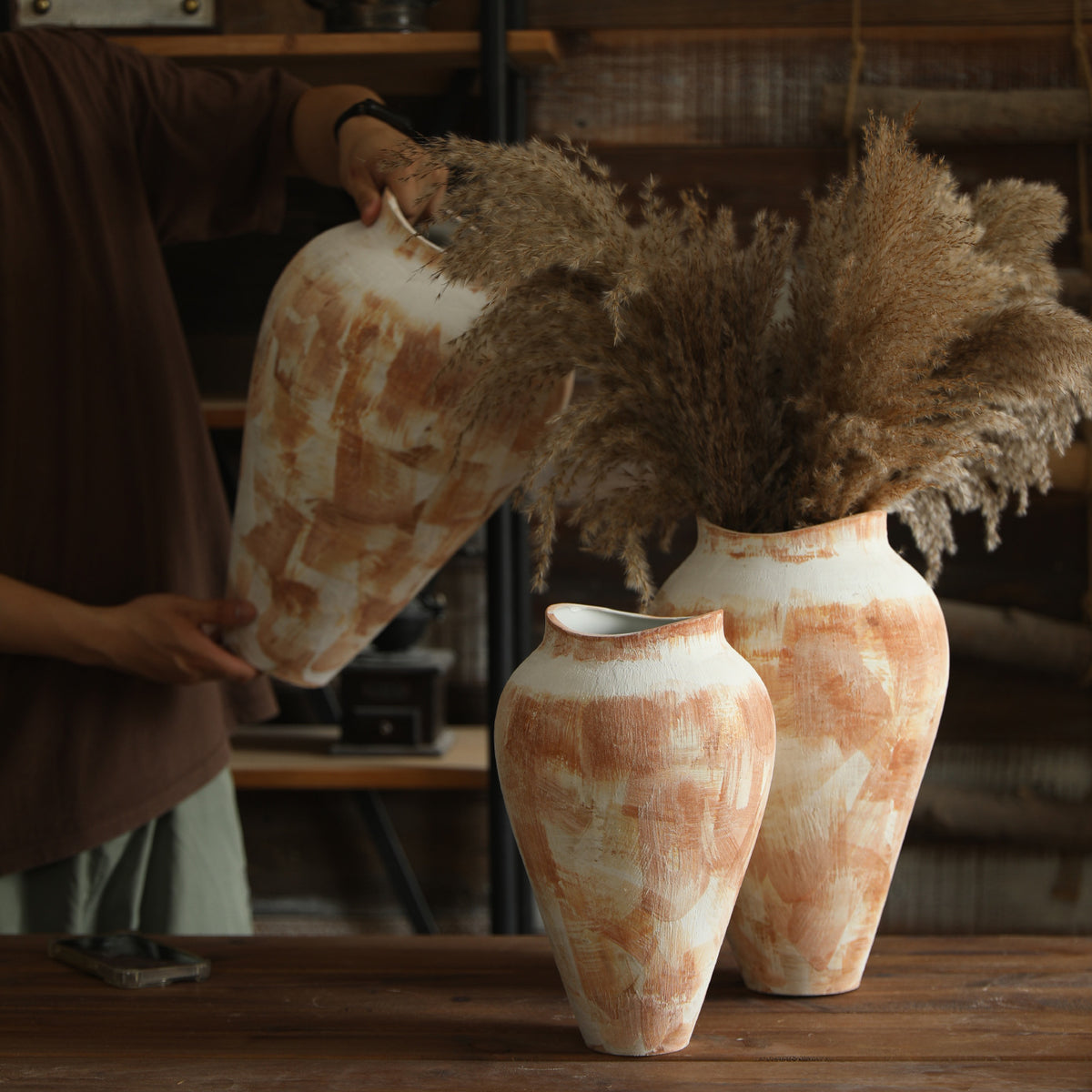 Cream terracotta abstract pottery vase styled as rustic home decor